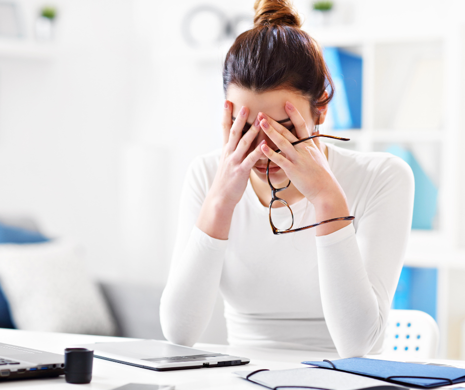 Woman in front of her computer frustrated because of failover